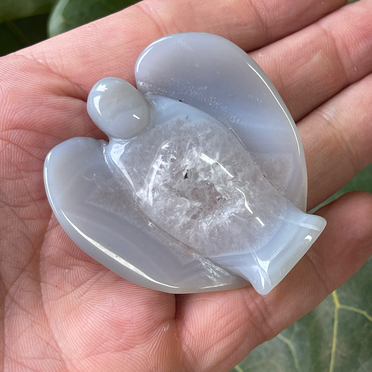Hand Carved Agate Angel with natural Geode