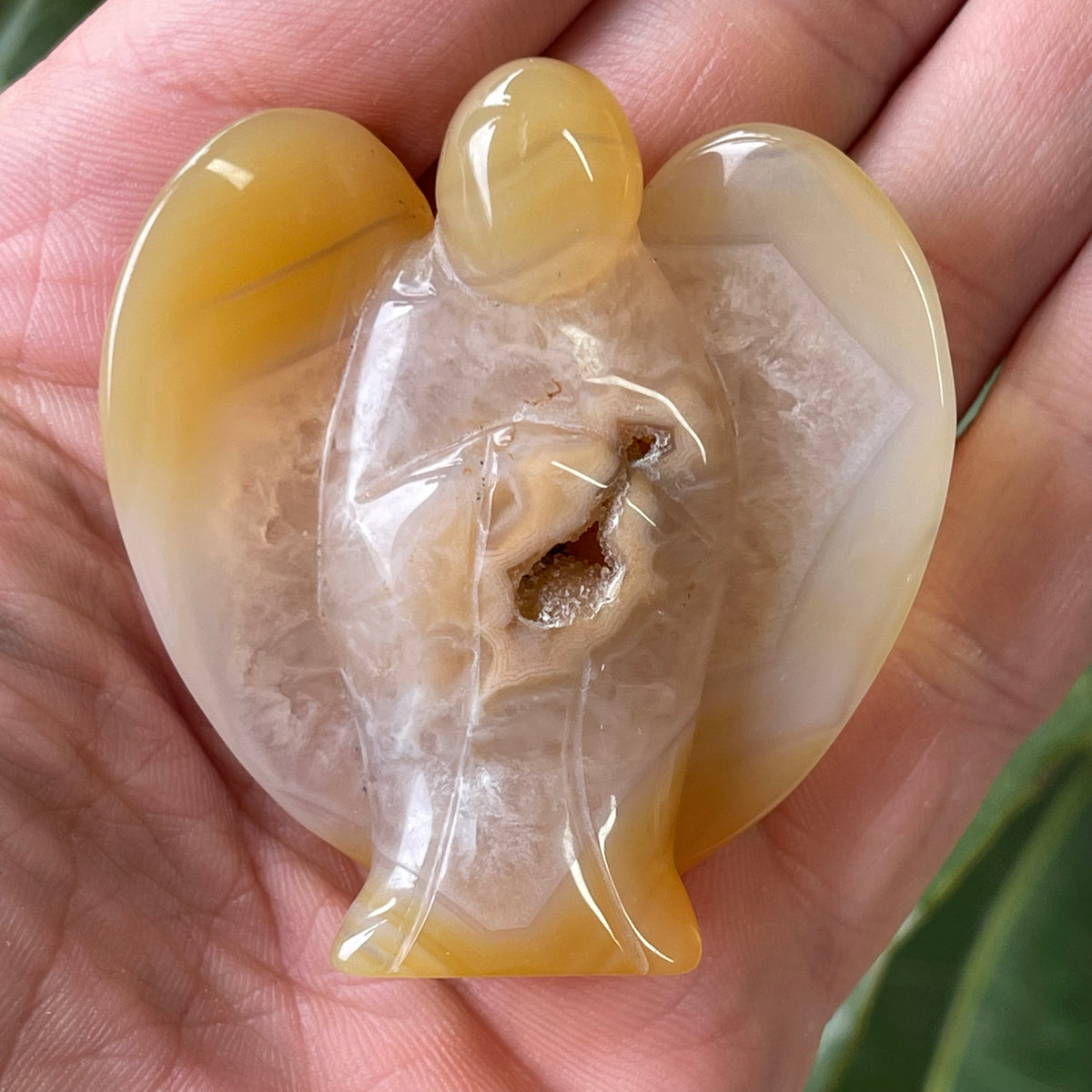 Hand Carved Agate Angel with natural Geode