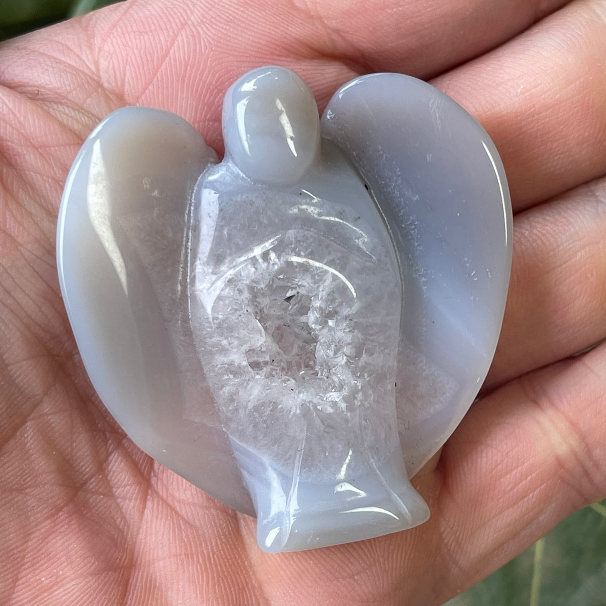 Hand Carved Agate Angel with natural Geode
