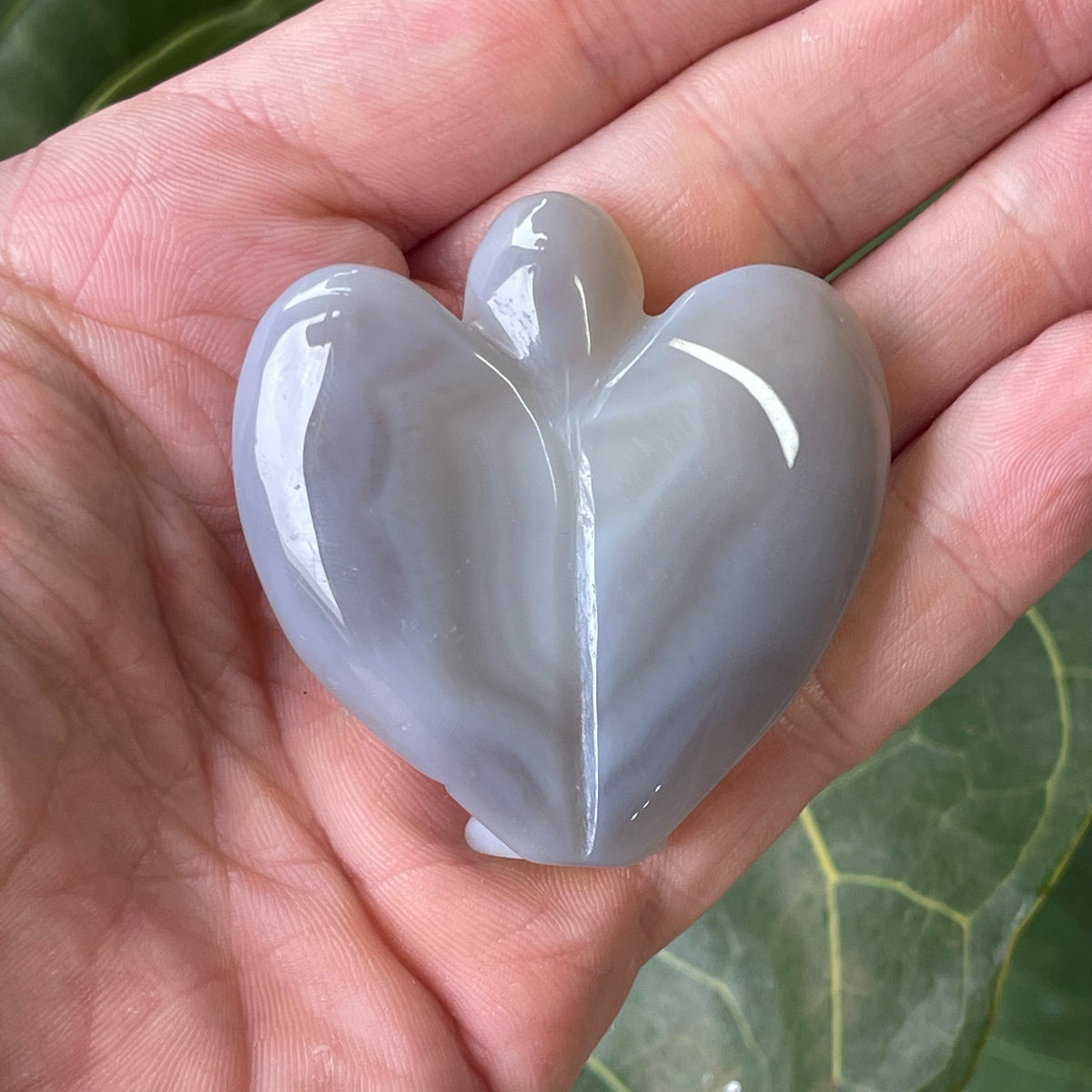 Hand Carved Agate Angel with natural Geode