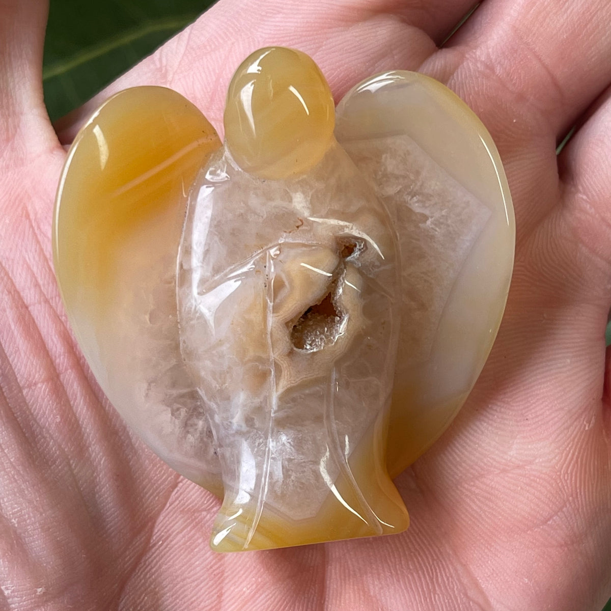 Hand Carved Agate Angel with natural Geode