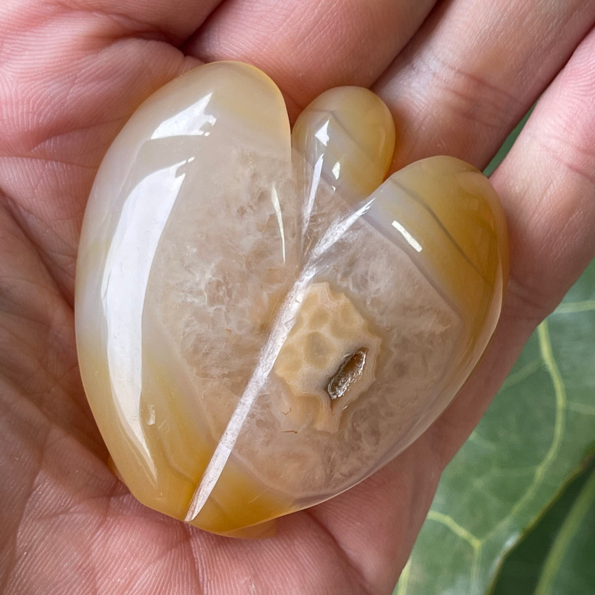 Hand Carved Agate Angel with natural Geode