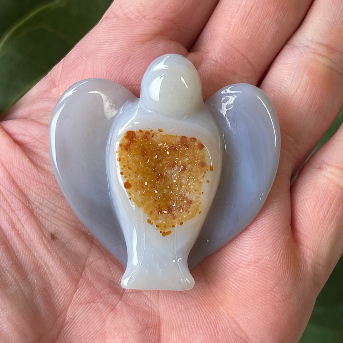 Hand Carved Agate Angel with natural Geode