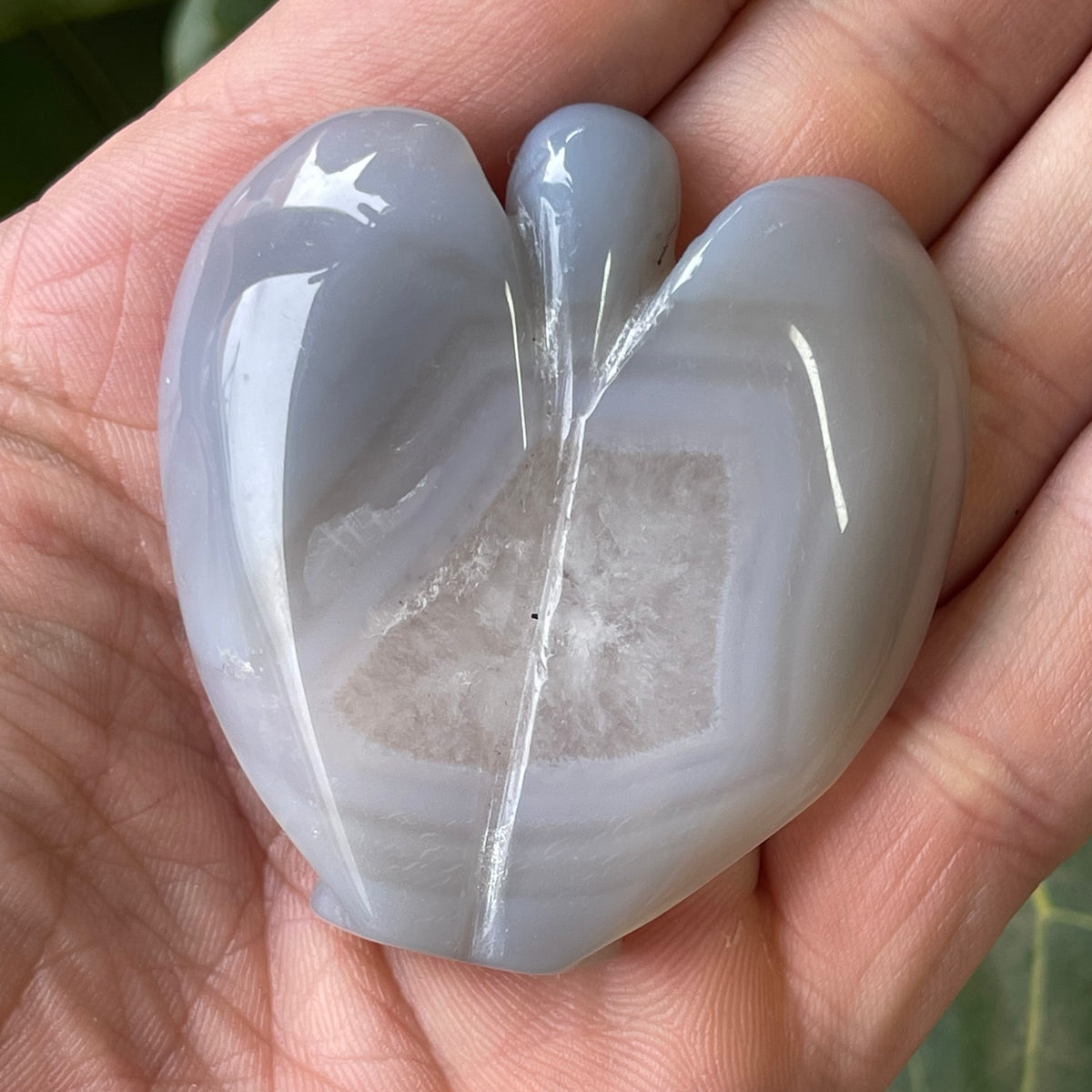 Hand Carved Agate Angel with natural Geode