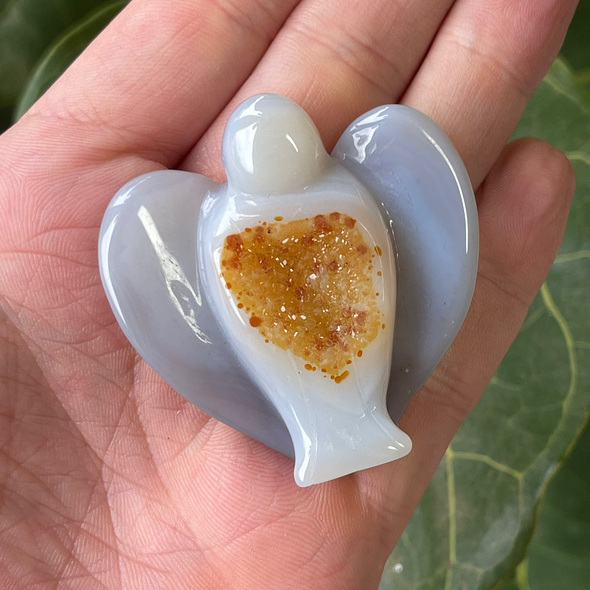 Hand Carved Agate Angel with natural Geode